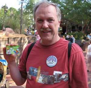 Dad shows off his Birthday Fastpass Card