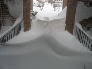 Odd snowdrifts in the "canyon" between condo buildings