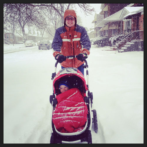 Happiness is a stroller ride in a snowstorm!